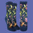 A pair of navy blue crew socks with a vibrant print of hummingbirds, pink blossoms, and green leaves, shown in both a folded view and a flat side view against a white background.