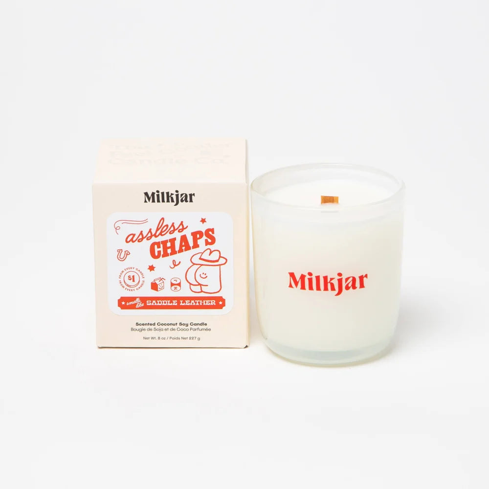 Milkgjar assless chaps scented coconut soy candle in frosted glass with red saddle leather branding 8oz