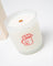 A frosted glass coconut soy candle jar with white wax, wooden wick, and a red cartoon cowboy hat for saddle leather fans