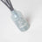 Gray frosted glass milkjar reed diffuser with blueberry tea scent and gray reeds by angus oliver