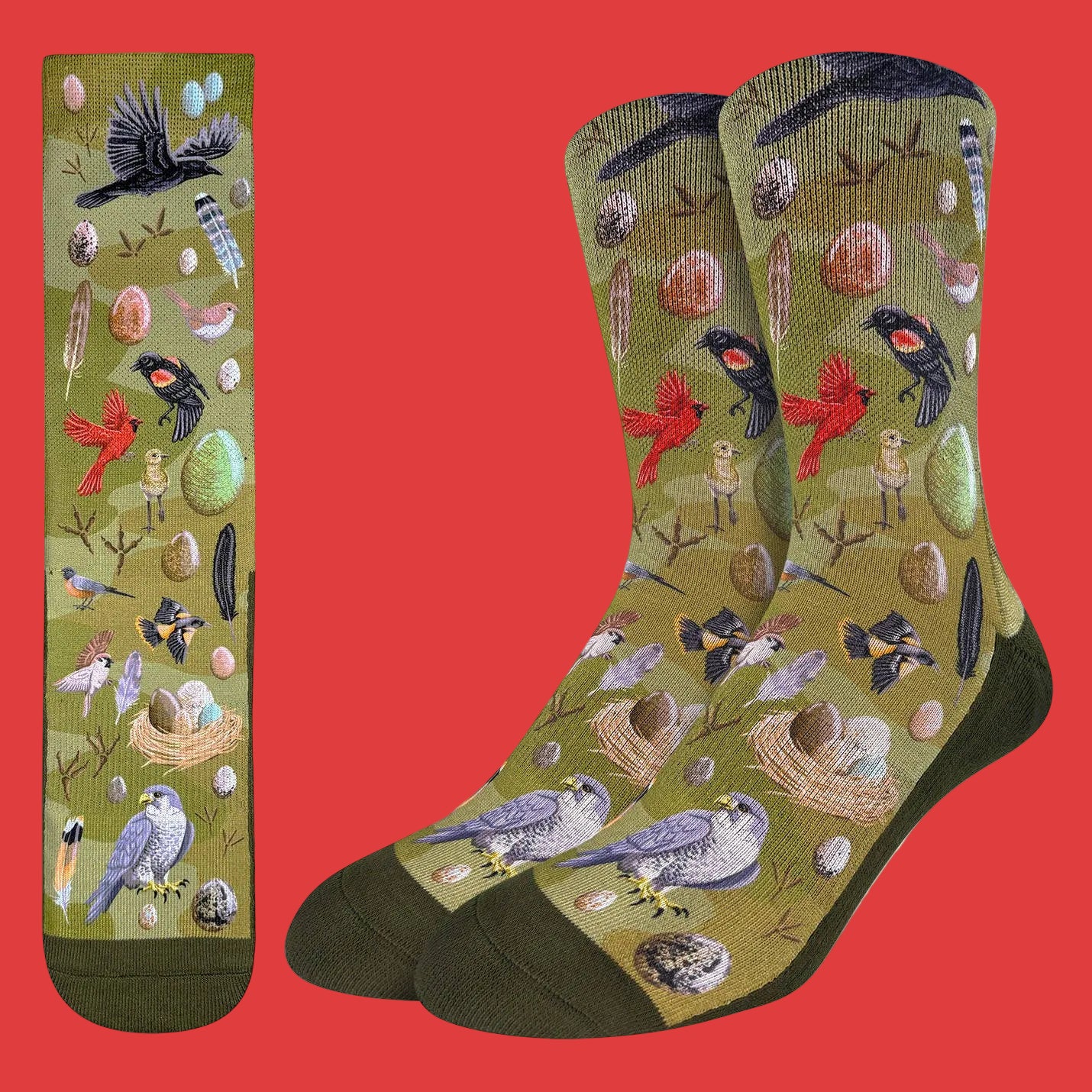Socks with bird and nature pattern on a green background