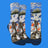 A pair of crew socks with a detailed nautical seagull and boat print, shown alongside a flat matching print panel on a white background.