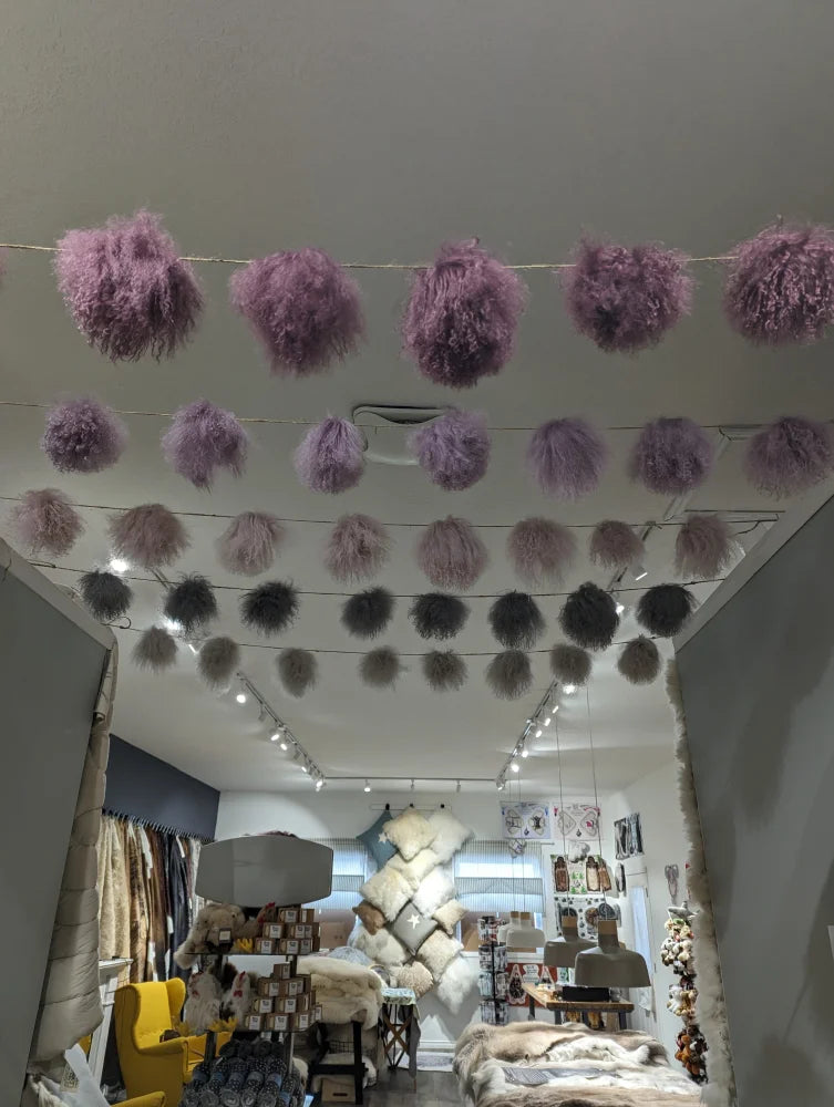 Dark mushroom sheepskin pom pom garland with lavender fur and silver accents