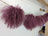 Dark pink sheepskin pom poms with dusty rose curly tulle garland