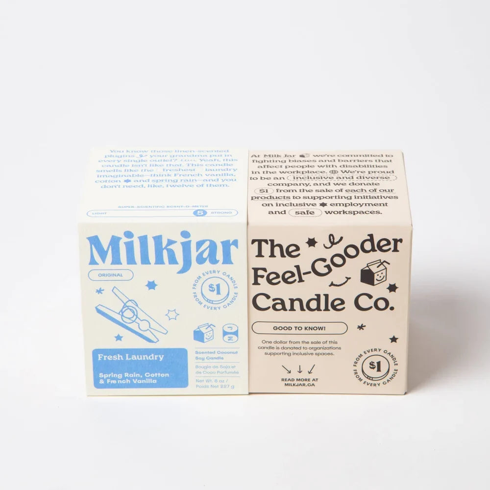 Two rectangular cardboard candle boxes in light blue and beige for fresh laundry soy candles with french vanilla scent