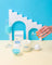 White milkjar coco soy candle with wooden wick and blue fresh laundry branding perfect for cowhide rugs scent