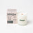 A frosted glass milkjar candle with white coconut soy wax and wooden wick labeled golden hour cashmere cedarwood coconut soy
