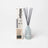Milkyjar golden hour reed diffuser in frosted light blue glass bottle with gray reeds for cashmere cedarwood musk scent