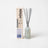 A translucent light blue frosted glass reed diffuser bottle with an etched teapot logo for sea salt scent