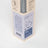 A beige cardboard box with 20 gray reed diffuser sticks labeled hygge with vanilla tobacco cedar and sea salt scents