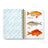 A judgy fish sticker book with a light blue spiral notebook cover and three colorful fish sticker illustrations