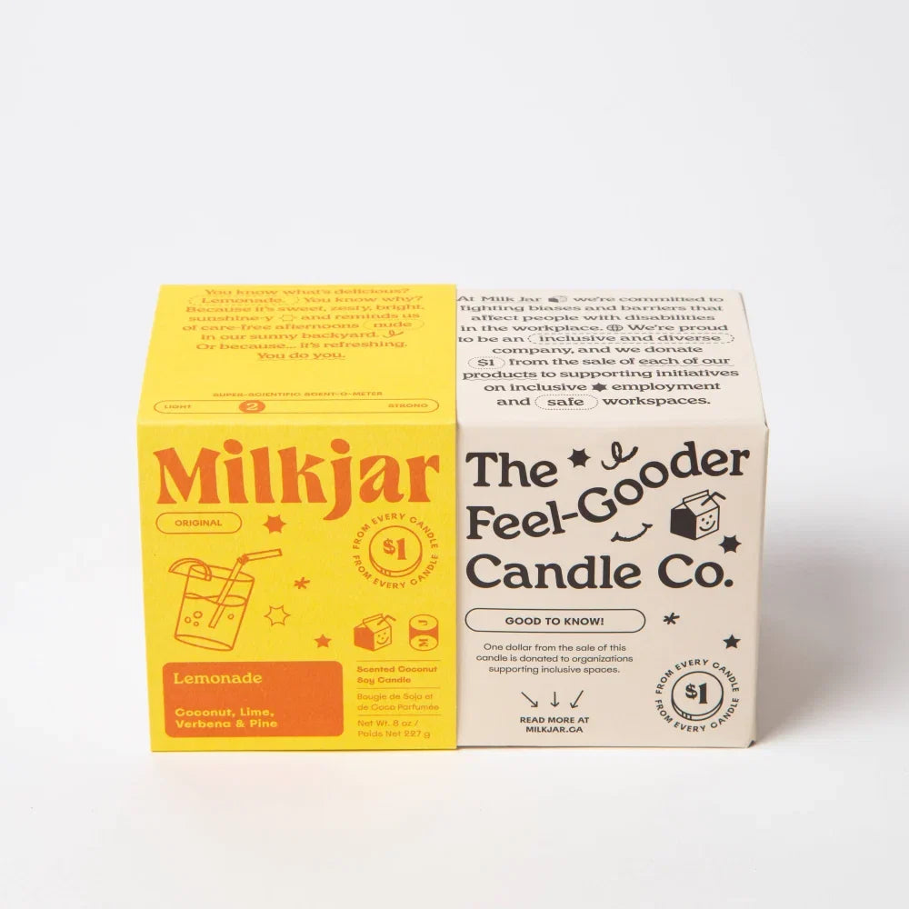 Vibrant yellow box of lemonade scented coconut soy candle with bold orange branding and playful illustrations