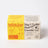 Vibrant yellow box of lemonade scented coconut soy candle with bold orange branding and playful illustrations