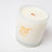 A creamy white lemonade scented coconut soy candle in a frosted jar with orange drink line art and lemonade text