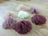 Light pink sheepskin pom pom with lavender tassel garland and fringed twine