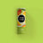 A cylindrical tube of mae mae mango natural lip balm with a bright green tropical fruit label and bold black text