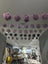 Medium pink sheepskin pom pom garland with lavender fur and silver accents