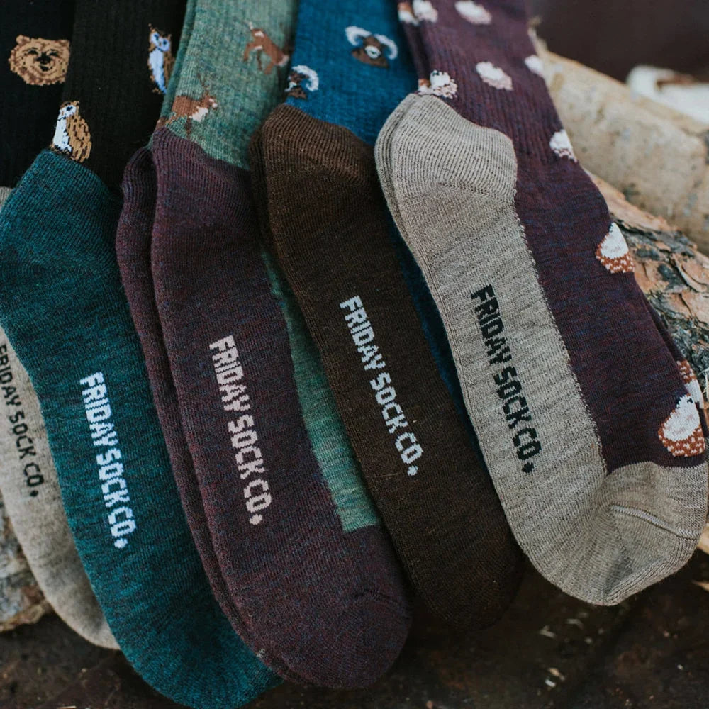 Men’s big horned sheep merino wool socks with cozy forest-themed embroidery in earthy tones for all-season hiking