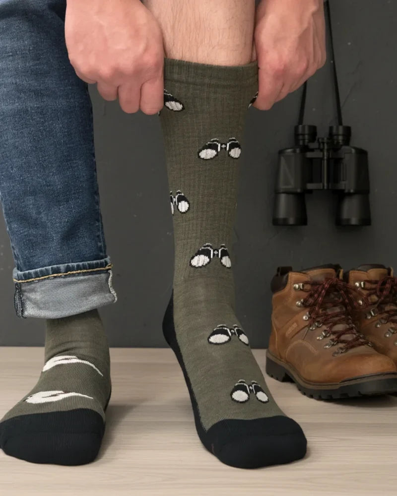 Men’s olive green merino wool socks with white and black binocular print and reinforced black toe cap for birdwatching