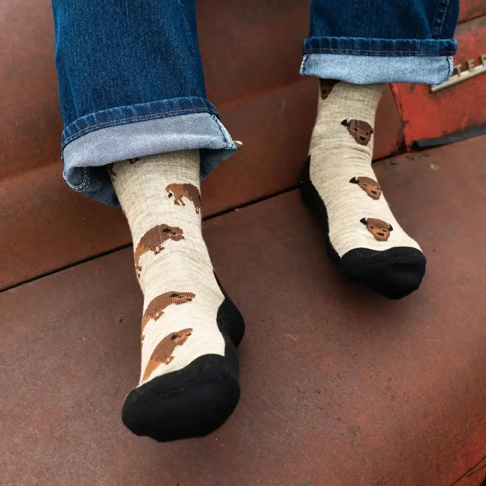 Beige merino wool socks with brown bison prints and black toe caps perfect for men hiking and trail use