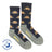 Men’s dark blue merino wool crew socks with pixelated cabin and snow design and gray heel and toe accents