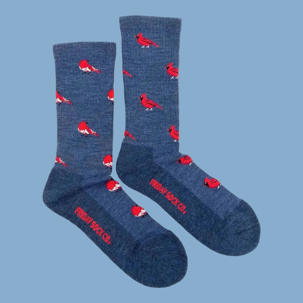 Blue men’s merino wool socks with red cardinal bird pattern perfect for outdoor cozy wear