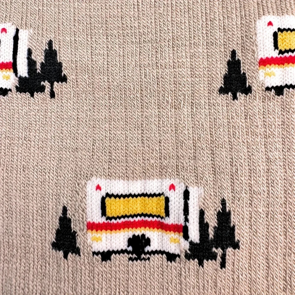 Beige knitted mens classic camper merino wool socks with playful white yellow red rvs and black pine trees pattern