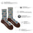 Men’s gray merino wool socks with playful blue cars green trees and yellow road signs on soft wool fabric