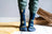 Dark blue merino wool socks with playful gold and light blue space patterns perfect for outdoor activity