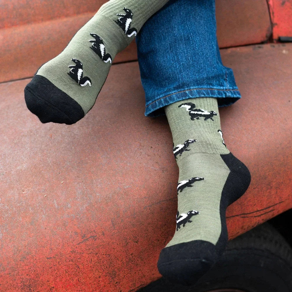 Olive green men’s skunk merino wool socks with black toe caps featuring soft comfortable wool socks design