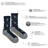 Dark blue men’s merino wool socks with white wolf and yellow moon pattern and gray reinforced heels and toes
