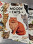 Spiral-bound moody cats sticker book with colorful cat illustrations and a vibrant cats sticker book cover design