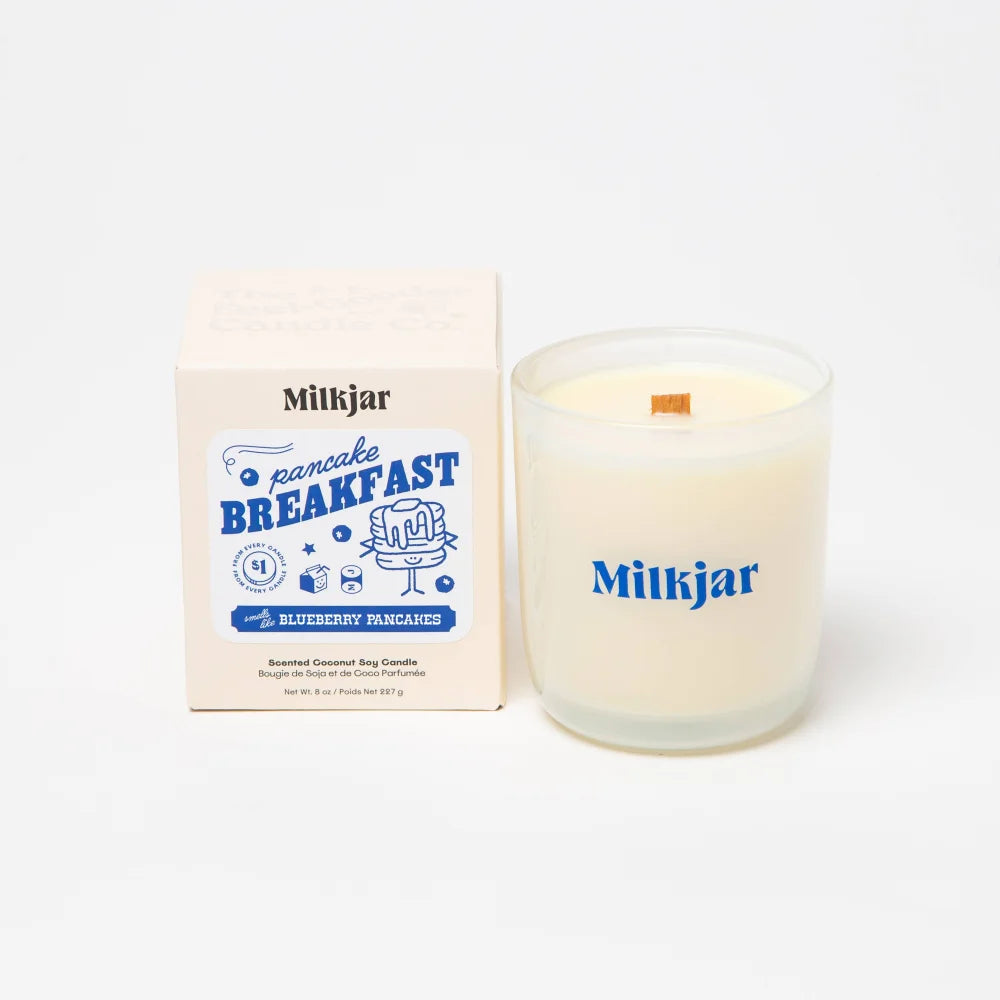 Milkkjar pancake breakfast soy candle in clear glass jar with blue branding scented like blueberry pancakes