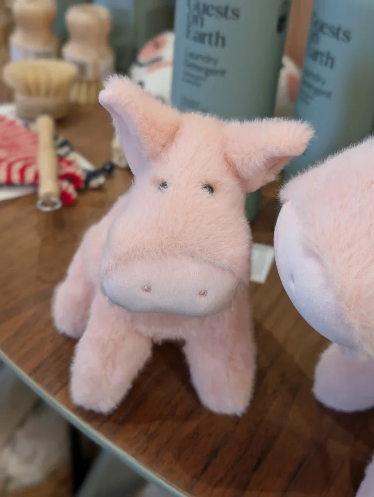 A large size soft pink piggies plush toy with lighter pink snout and black button eyes perfect for cuddling