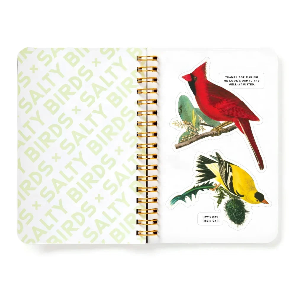 A spiral-bound salty birds sticker book with a white cover and colorful bird stickers on the open right page