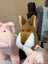 A plush so soft fox toy with brown and white fur, black button eyes, and a soft stitched nose perfect as a dachshund toy