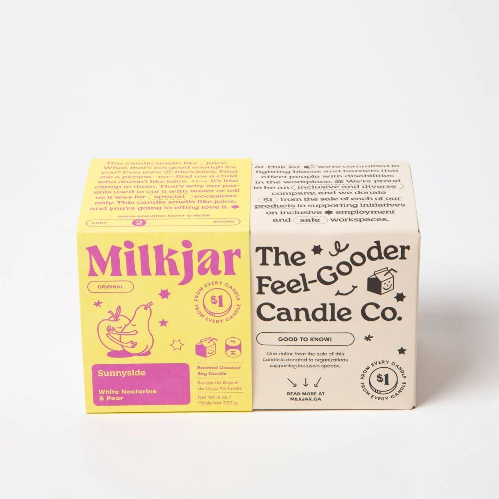 Yellow and white cardboard boxes for sunnyside pear and nectarine coconut soy candle with playful pear illustrations and candle smells