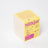Bright yellow cardboard box with purple text for sunnyside pear and nectarine coconut soy candle smells jar packaging