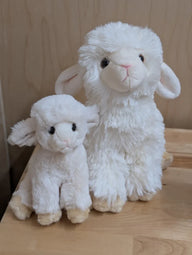 Super soft lambs white plush stuffed animal with fluffy texture and black button eyes perfect for cuddling