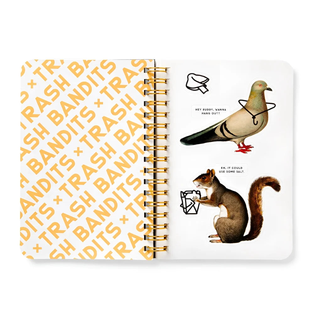 Open trash bandits sticker book with yellow spiral-bound cover and pages showing a pigeon and squirrel bandits sticker designs