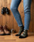 Olive green and black women’s bird and birdwatching merino wool socks with white graphic details for all-season use