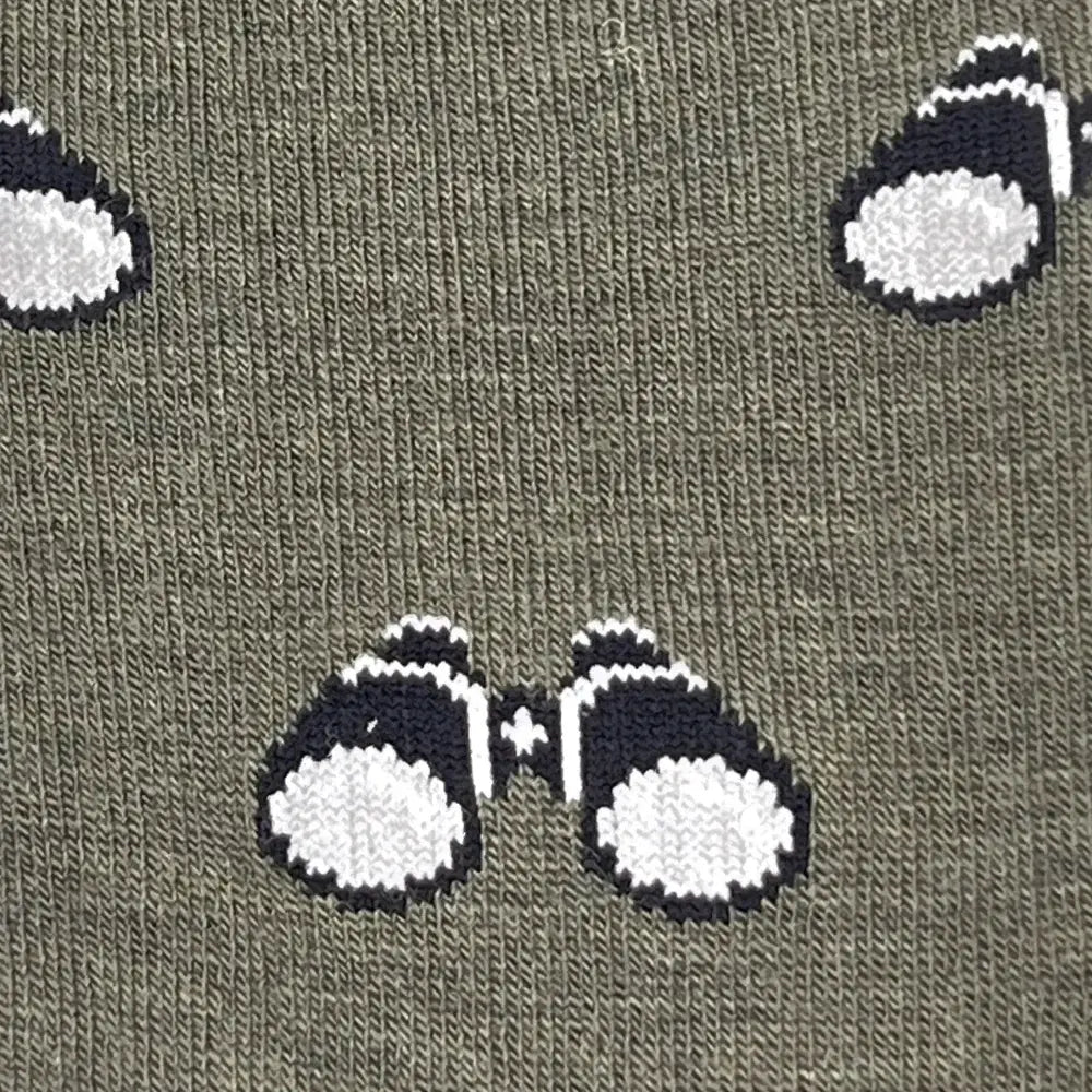 Women’s olive green merino wool socks with playful black and white binocular pattern all-season birdwatching design
