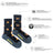Women’s camping at night merino wool socks in dark blue with orange flames and tents made from rws certified wool