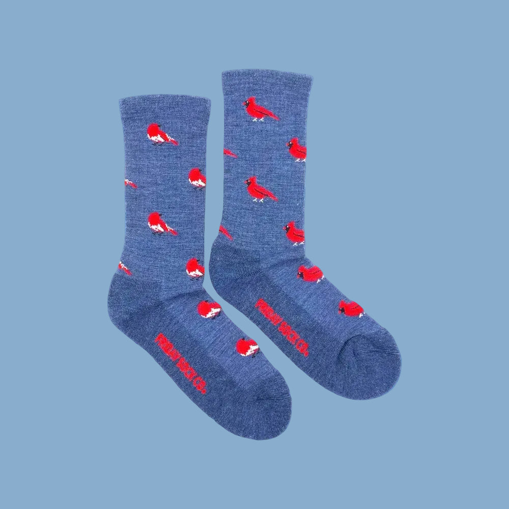 Blue merino wool socks with playful red cardinal birds featuring soft premium wool for women