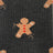 Dark gray merino wool socks with tan gingerbread man and red maple leaf details for cozy outdoor wear