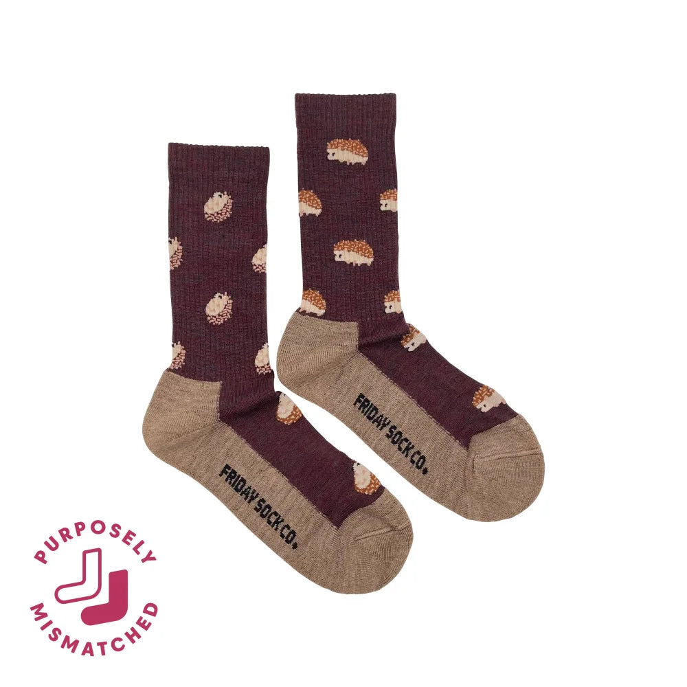 Dark purple women’s merino wool socks with small beige and brown hedgehog pattern for breathable warmth