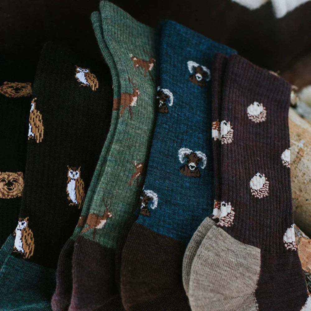 A cozy set of womens owl merino wool socks in earthy tones with embroidered woodland animals by angus oliver