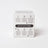 Back of white cardboard box with black text and star icons showing candle use instructions for woodland essential oil coconut soy candle